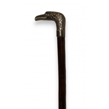 Walking stick with a silver-coloured metal handle featuring an eagle
