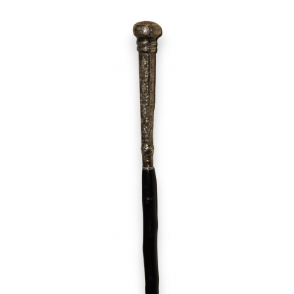 Walking stick with a silver handle featuring flowers