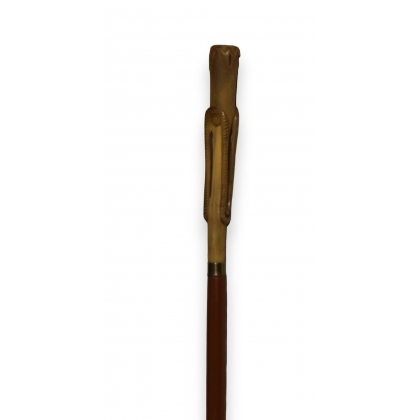 Walking stick with a carved horn handle