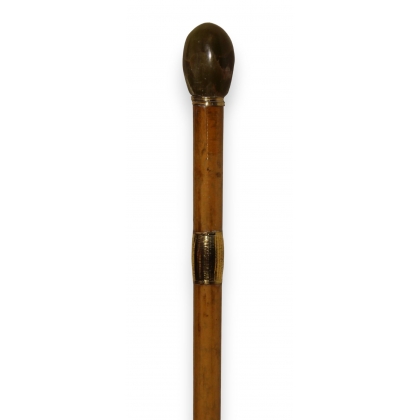 Walking stick with a green marble knob