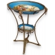 Table ovale, pieds laiton.