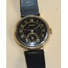 TAVANNES gold watch, black leather strap