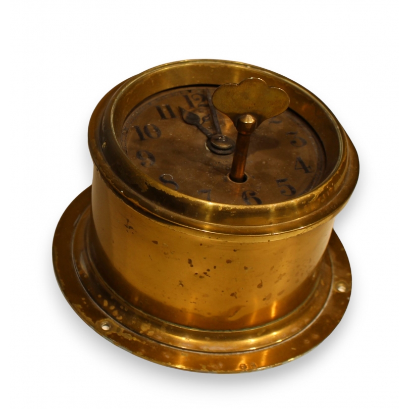 Round brass ship’s clock