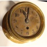 Round brass ship’s clock