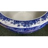 Blue and white plant pot with a butterfly design