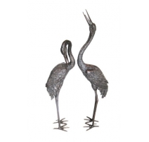 Pair of cranes in bronze