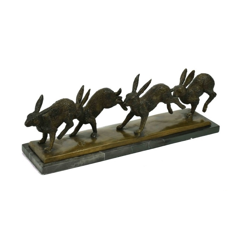 Suite de quatre lièvres en bronze, socle marbre