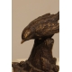 Moineau sur une souche en bronze