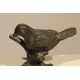 Oiseau sur une branche en bronze