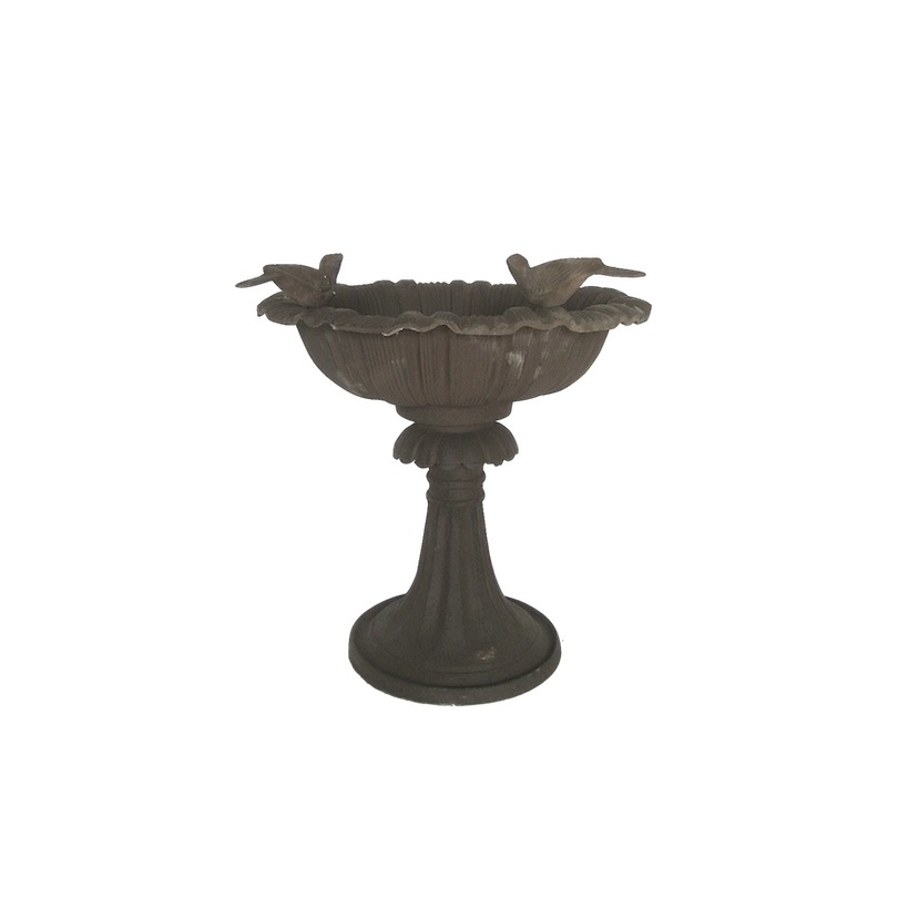 Low bird bath in brown cast iron
