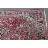Sarouk carpet with a red background