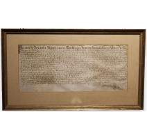 Document ancien encadré daté 1699