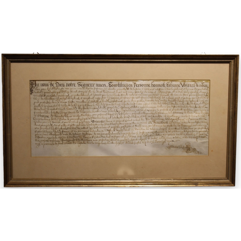 Document ancien encadré daté 1699
