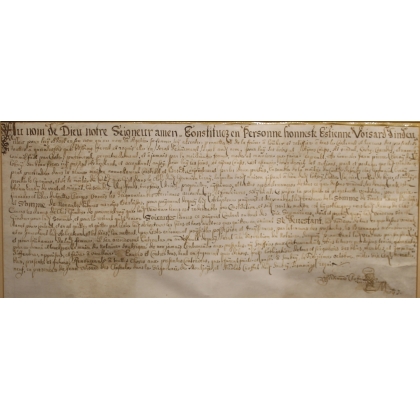 Document ancien encadré daté 1699