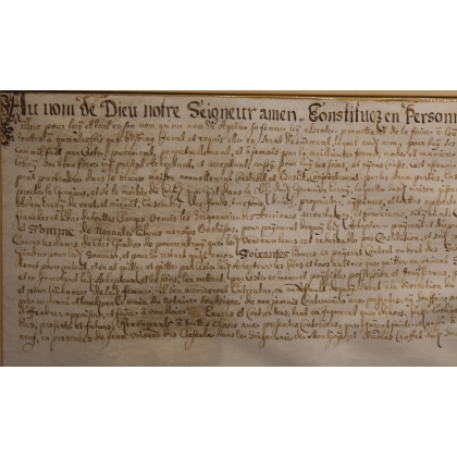 Document ancien encadré daté 1699
