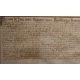 Document ancien encadré daté 1699