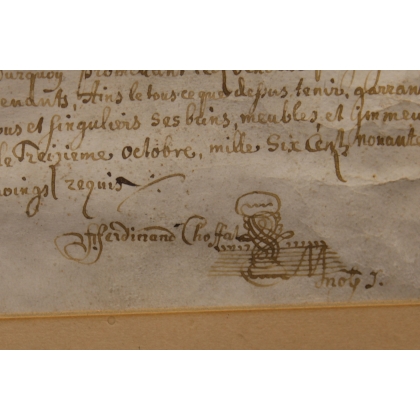 Document ancien encadré daté 1699