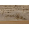 Document ancien encadré daté 1699