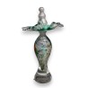 Green and yellow glass bottle marked LUZORO 01