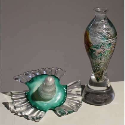 Green and yellow glass bottle marked LUZORO 01