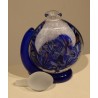 Flacon bleu et blanc en verre de LUZORO 97