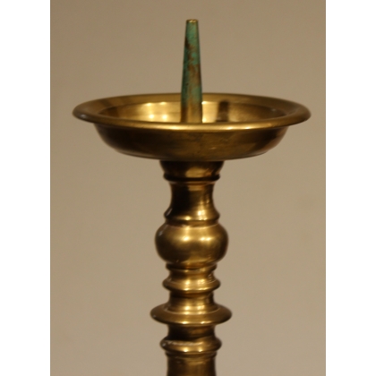 A pair of bronze candlesticks