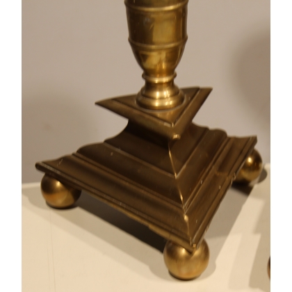 A pair of bronze candlesticks