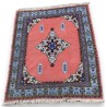 Pink Moroccan wool rug with a blue border