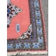 Tapis marocain en laine rose bordure bleue