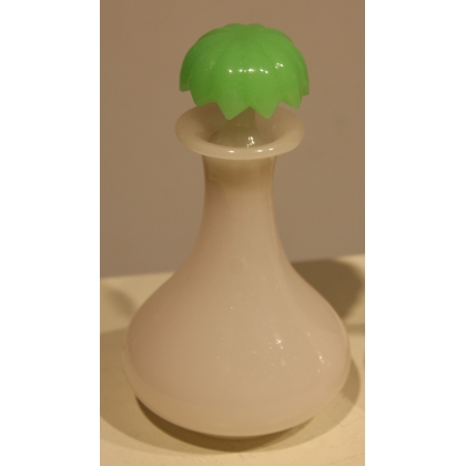A pair of green and white opaline bottles