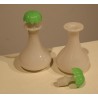 A pair of green and white opaline bottles