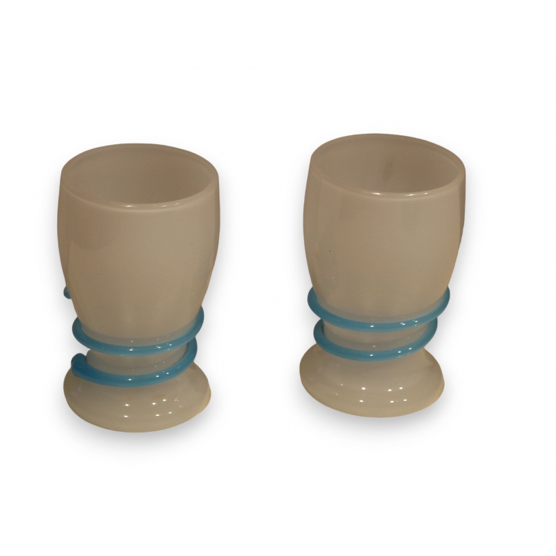 Pair of white opaline snake-patterned tumblers