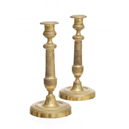 Pair of guilloché-decorated Empire-style candlesticks