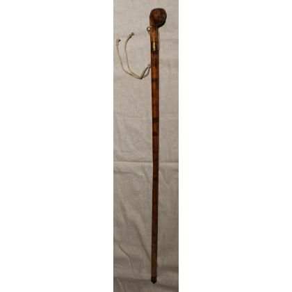 Walking stick with a carved head