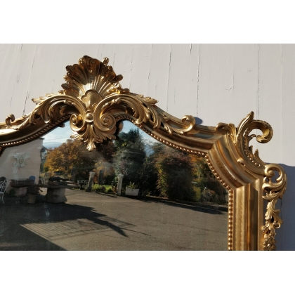 Miroir Napoléon III bois doré, fronton coquille