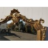 Miroir Napoléon III bois doré, fronton coquille