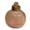 A clear crystal bottle decorated with flowers