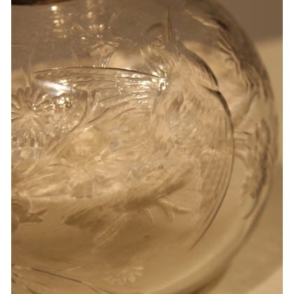 Clear crystal bottle with a floral design
