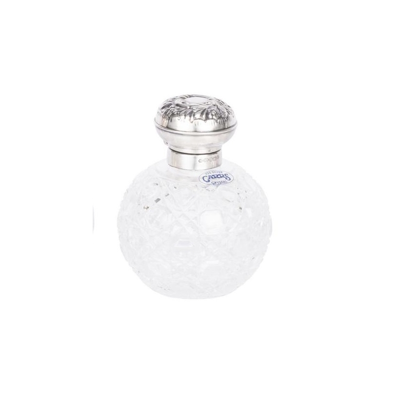 Diamond-cut crystal bottle by CARRS