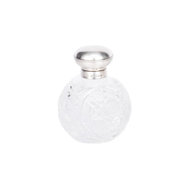 Diamond-cut crystal bottle by CARRS