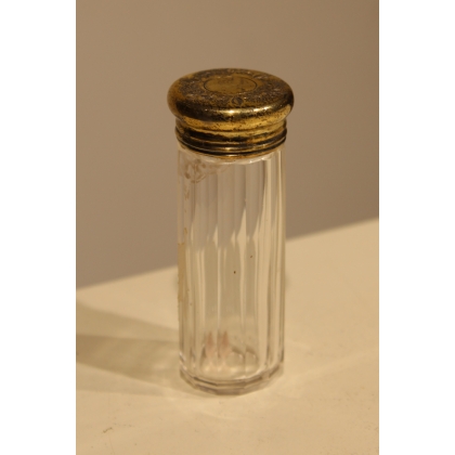 Toiletries bottle with a vermeil-plated cap