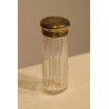Toiletries bottle with a vermeil-plated cap