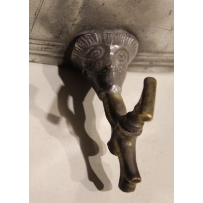 Pewter fountain decorated with dolphins