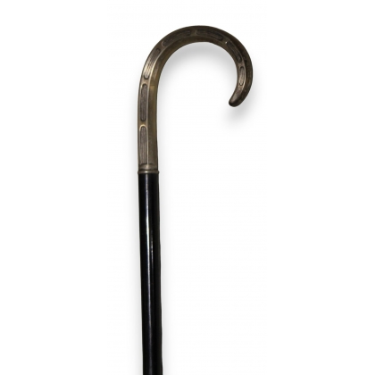 Corbin walking stick in silver-coloured metal, with a blackened wooden shaft