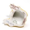 Grenouille en porcelaine jaune signée SANDOZ