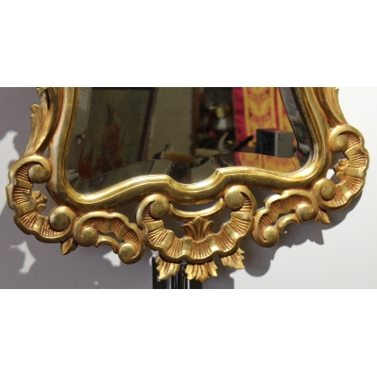 Miroir en bois sculpté doré style Louis XV
