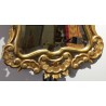 Miroir en bois sculpté doré style Louis XV