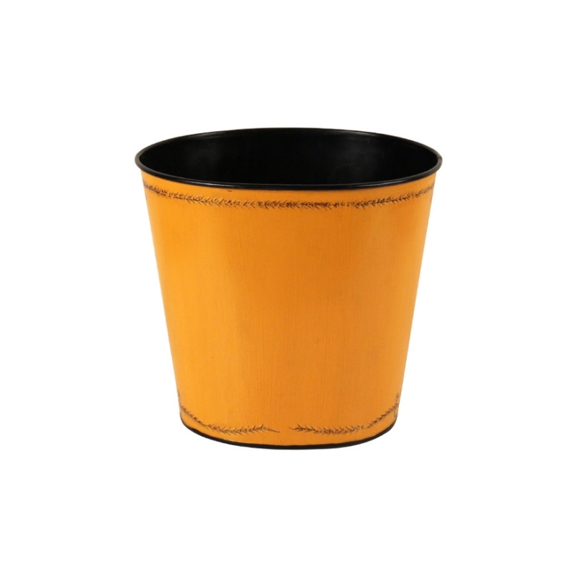 Oval wastepaper basket made of yellow sheet metal