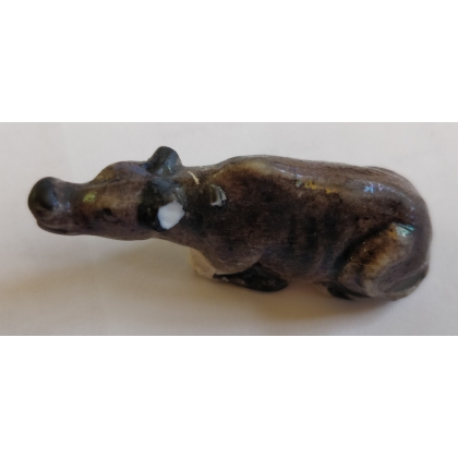 Small porcelain buffalo at  Moinat SA  - Antiques and home décor