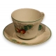 Tasse et sous-tasse en porcelaine motif pomme